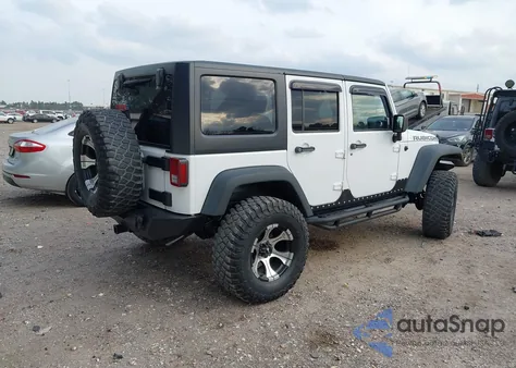 2011 Jeep Wrangler Unlimited Rubicon из США, поврежденный, VIN 1J4BA6H10BL536027